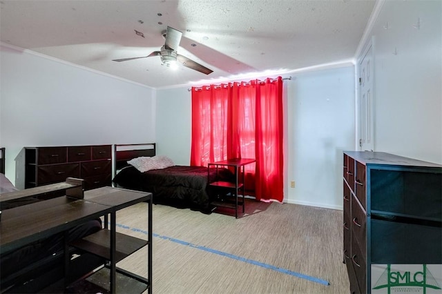 bedroom with crown molding, ceiling fan, and wood finished floors