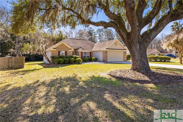 view of front of property with a garage, a front yard, fence, and brick siding