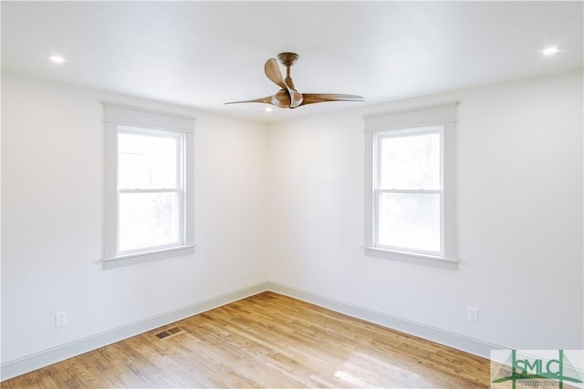 unfurnished room featuring visible vents, baseboards, a ceiling fan, wood finished floors, and recessed lighting