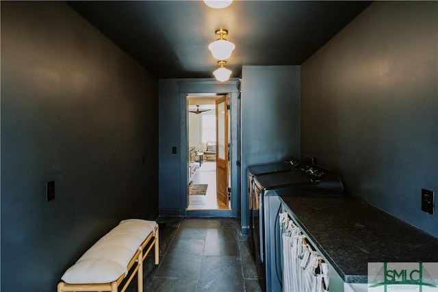 kitchen featuring dark countertops and independent washer and dryer