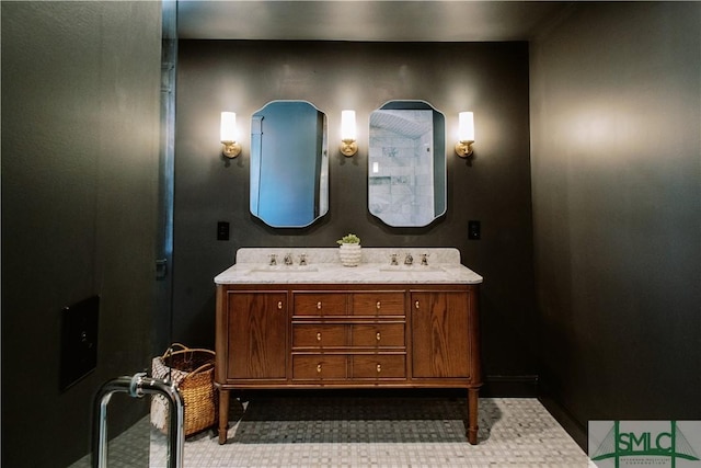 bathroom featuring a sink and double vanity