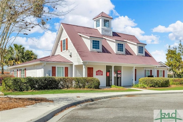 view of front of home featuring metal roof