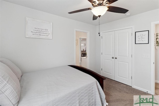 bedroom featuring baseboards, a closet, a ceiling fan, and carpet flooring