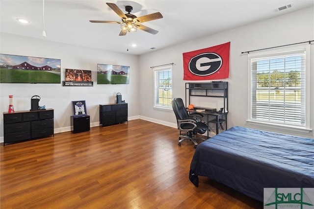 bedroom with baseboards, visible vents, ceiling fan, wood finished floors, and recessed lighting