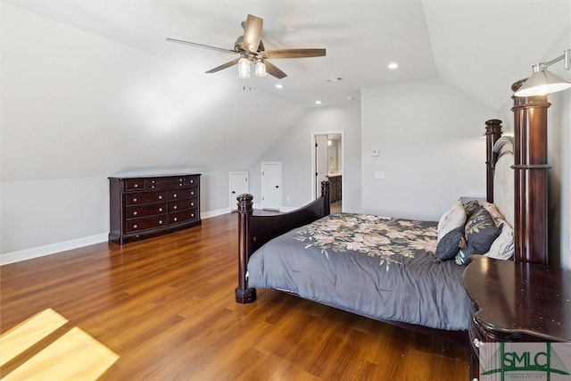 bedroom featuring lofted ceiling, recessed lighting, baseboards, and wood finished floors