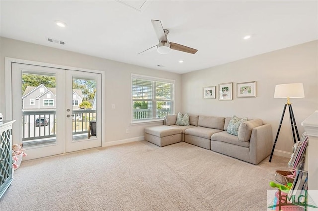 living area with baseboards, visible vents, carpet flooring, french doors, and recessed lighting