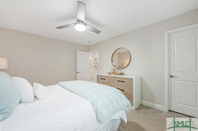 bedroom featuring light carpet, ceiling fan, and baseboards