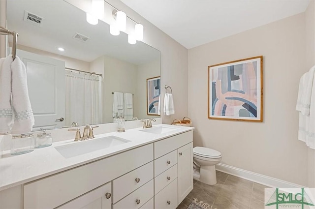 full bath featuring toilet, visible vents, and a sink