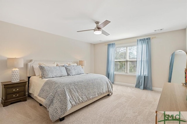 123 Canter Ct, Savannah, GA 31406 - bedroom with light colored carpet, baseboards, and ceiling fan