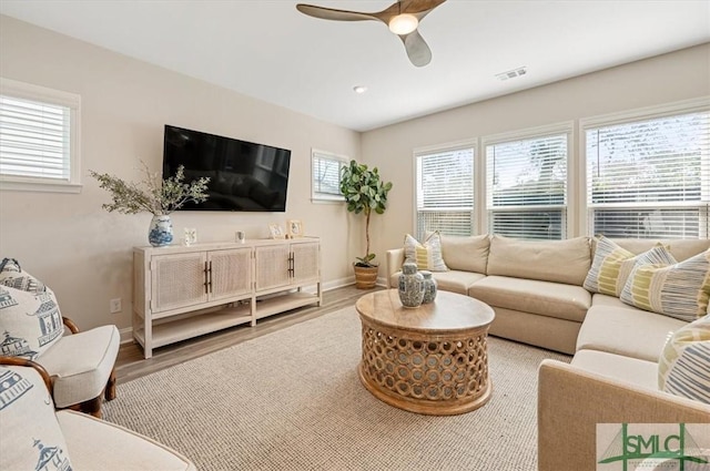 123 Canter Ct, Savannah, GA 31406 - living room featuring wood finished floors, baseboards, and ceiling fan
