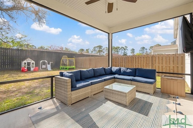123 Canter Ct, Savannah, GA 31406 - deck featuring ceiling fan, an outdoor hangout area, and a fenced backyard