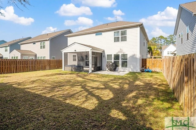 back of house with a lawn, a patio, a sunroom, a fenced backyard, and a residential view