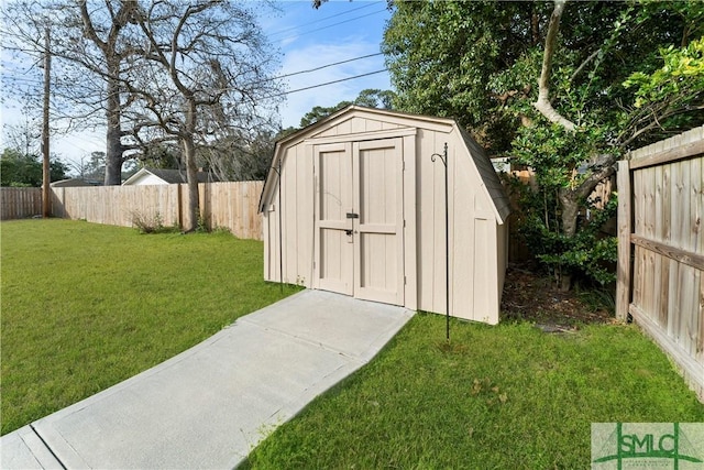 view of shed featuring a fenced backyard