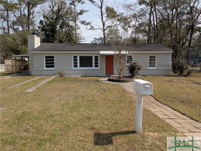 single story home featuring a front yard, fence, brick siding, and a chimney