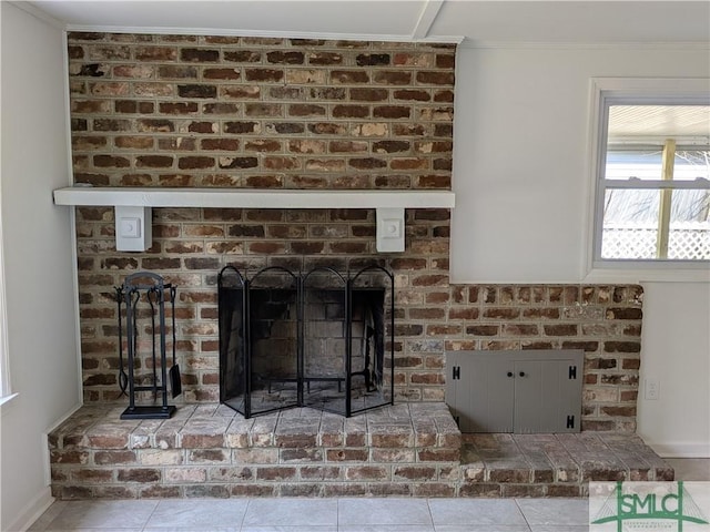 room details with ornamental molding and a fireplace