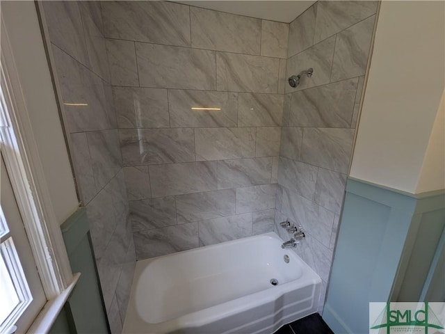 full bathroom featuring  shower combination