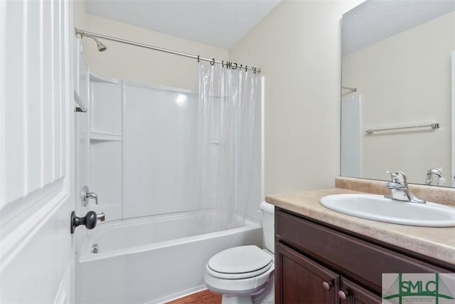 full bathroom featuring vanity, toilet, and shower / bath combo with shower curtain