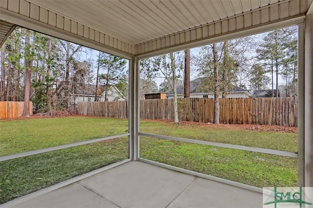 unfurnished sunroom with plenty of natural light