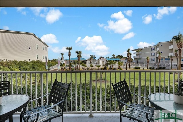 balcony featuring a residential view