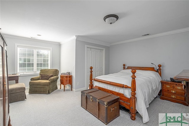 carpeted bedroom with visible vents, baseboards, a closet, and ornamental molding