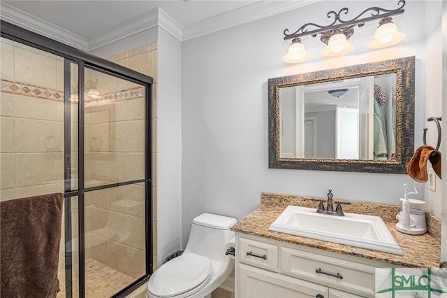 full bathroom with a stall shower, toilet, crown molding, and vanity