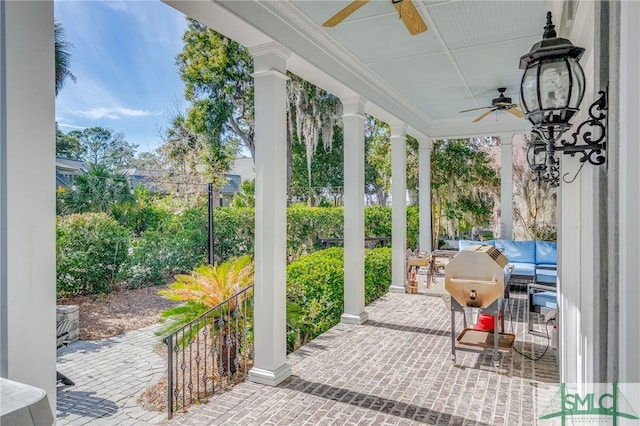 view of patio / terrace featuring a porch and a ceiling fan