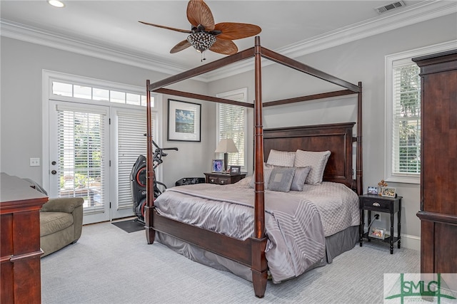 carpeted bedroom featuring access to exterior, visible vents, crown molding, and ceiling fan