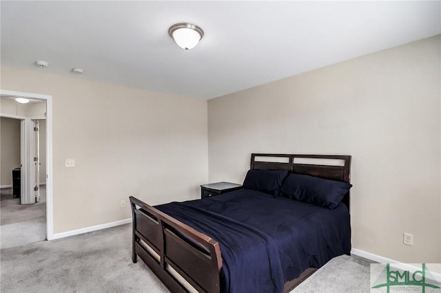 bedroom featuring baseboards and carpet floors