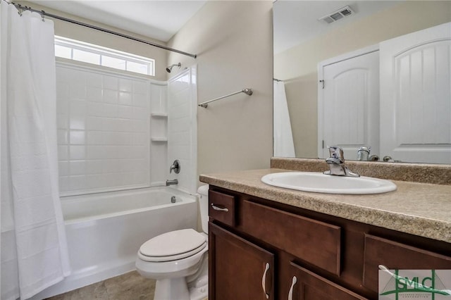 full bathroom with tile patterned flooring, visible vents, toilet, shower / bath combo, and vanity