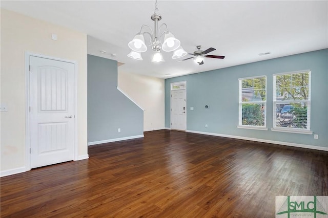 unfurnished living room featuring visible vents, baseboards, ceiling fan with notable chandelier, and wood finished floors