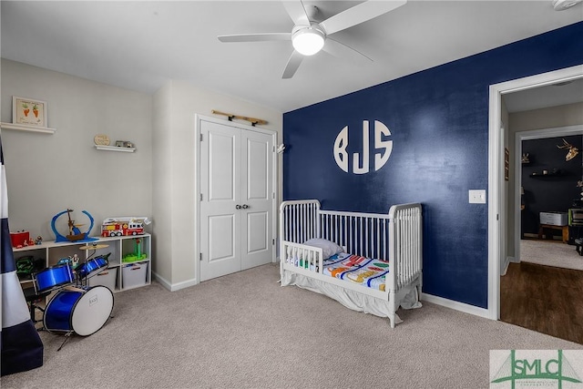 bedroom with carpet flooring, a ceiling fan, and baseboards