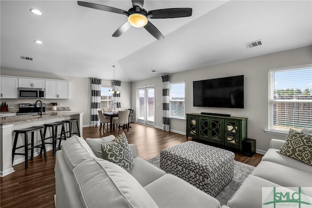 living room featuring dark wood-style floors, visible vents, baseboards, recessed lighting, and ceiling fan