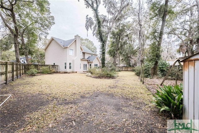 view of yard featuring a fenced backyard