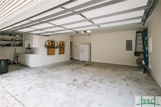 garage featuring electric panel, a sink, and white fridge with ice dispenser