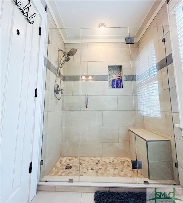 full bathroom with a shower stall