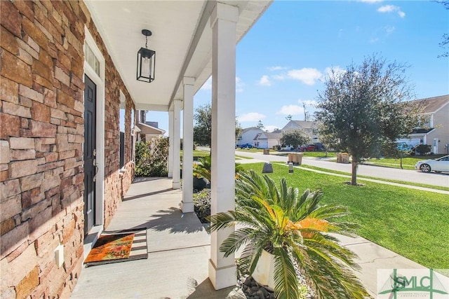 view of patio featuring a porch