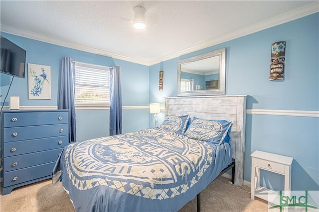 bedroom featuring carpet, crown molding, and a textured ceiling