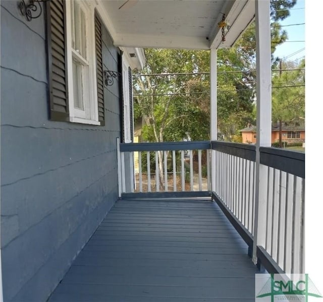 wooden deck featuring covered porch