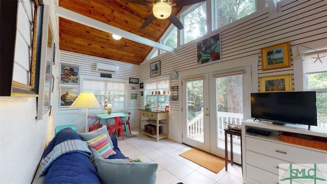 living area with tile patterned flooring, plenty of natural light, wood ceiling, and a wall mounted AC