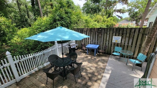 view of patio / terrace with fence