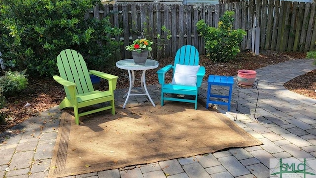 view of patio with fence