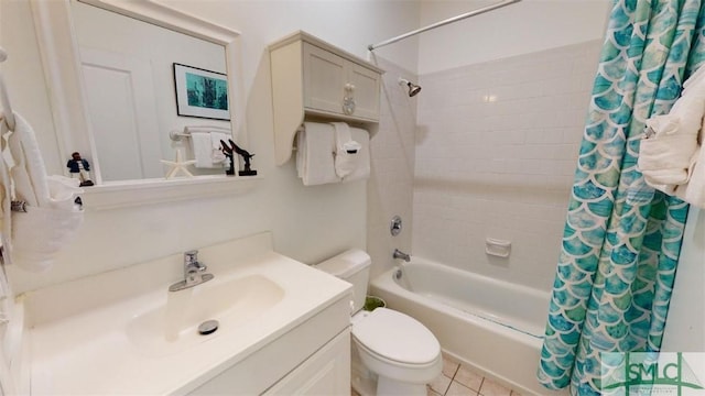 bathroom with vanity, shower / tub combo, and toilet