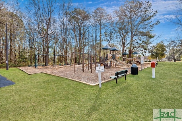 community jungle gym featuring a yard