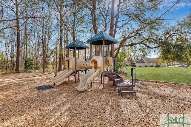 communal playground featuring a lawn