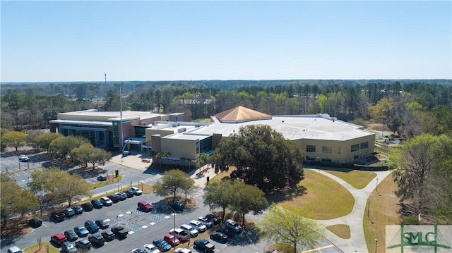 bird's eye view featuring a view of trees