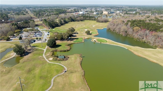 aerial view with view of golf course and a water view