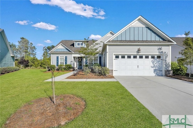 view of front of property featuring a front yard, an attached garage, board and batten siding, and concrete driveway