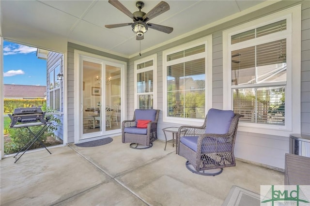 view of patio with ceiling fan