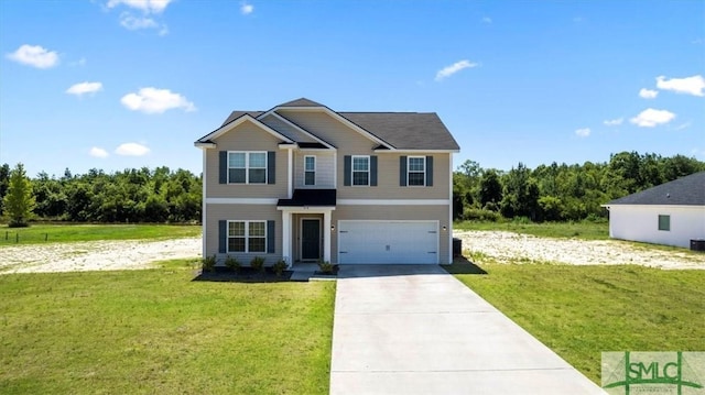 view of front facade with an attached garage, concrete driveway, and a front yard