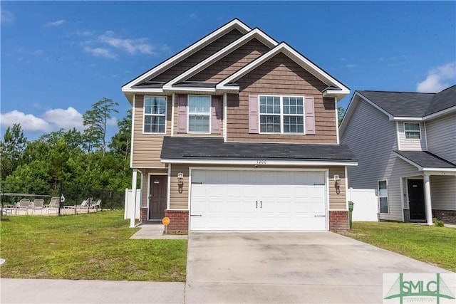 craftsman inspired home with brick siding, driveway, a front lawn, and fence